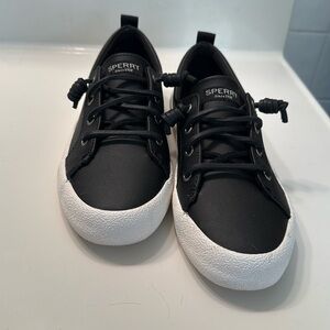 Sperry black leather tennis shoes.